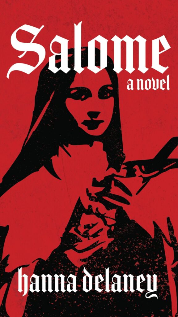 Salome is a religious horror mhystery novel about a novice nun who becomes a vampire slayer. Catholic horror books like The Exorcist and The Omen. Image shows the cover of Salome, an October 2026 release horror book published by Tiny Worlds Publishing. Salome is a religious horror novel by author Hanna Delaney. It is a Gothic story about a young Catholic nun who becomes a vampire slayer, travelling to Liverpool in 1885 to join a clandestine order of vampire slayers and demonologists. Salome is a religious horror mystery taking inspiration from Catholicism and Catholic mythology regarding angels, demons and saints.